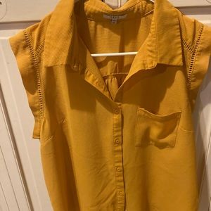 Gold sleeveless blouse